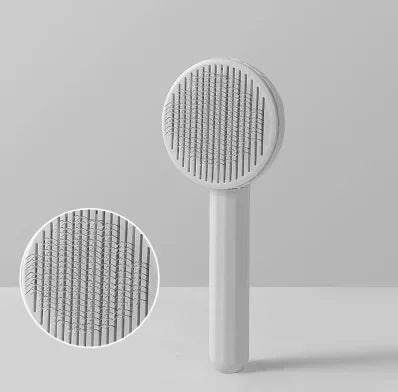 Cepillo quitapelos para gatos y mascotas de la marca Happy Pets LS, con cerdas para eliminar pelos sueltos.